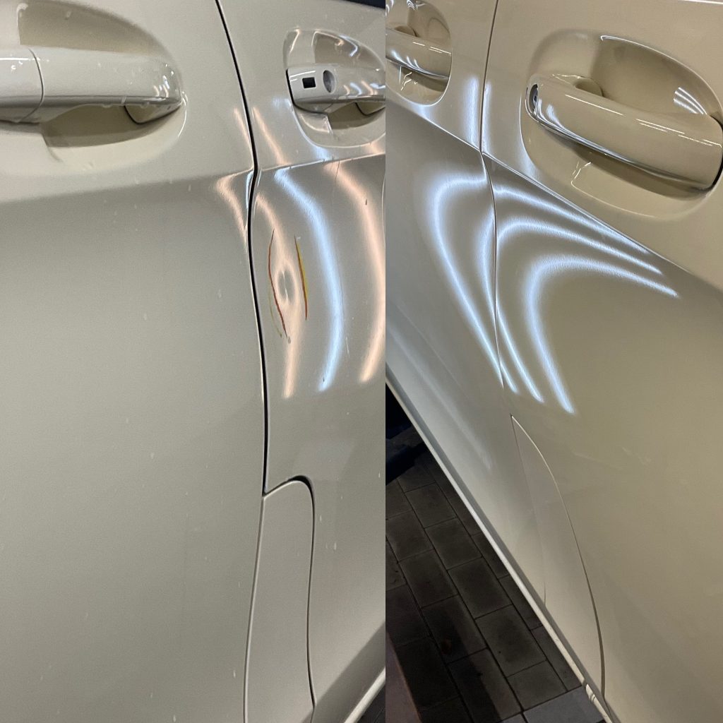 Paintless Dent Repair (PDR) on an aluminium door in Caterham